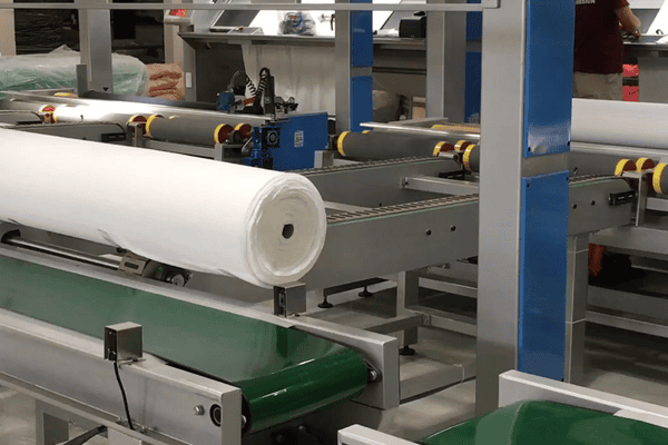 Automatización de empaquetado textil: 5 razones clave para elegir una máquina de embalaje de rollo completamente automática